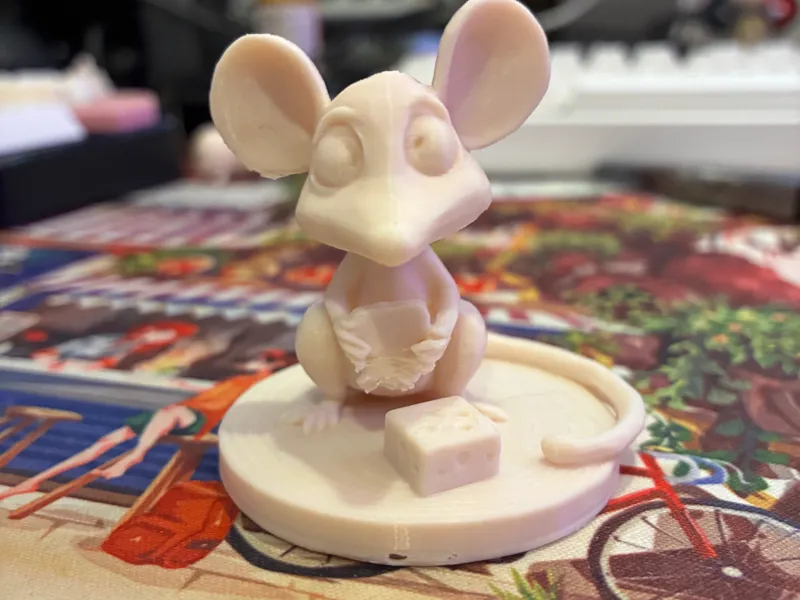 cute little mouse eating cheese