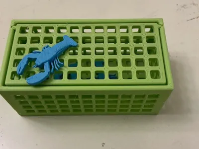 Lobster trap and lobsters miniature