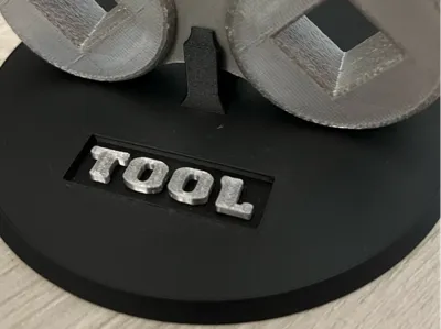 Stand for Tool "tool" logo