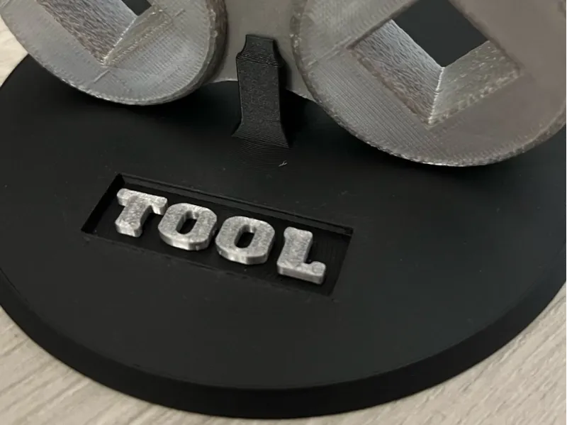 Stand for Tool "tool" logo