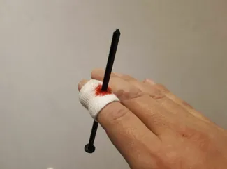 Nail through finger prank
