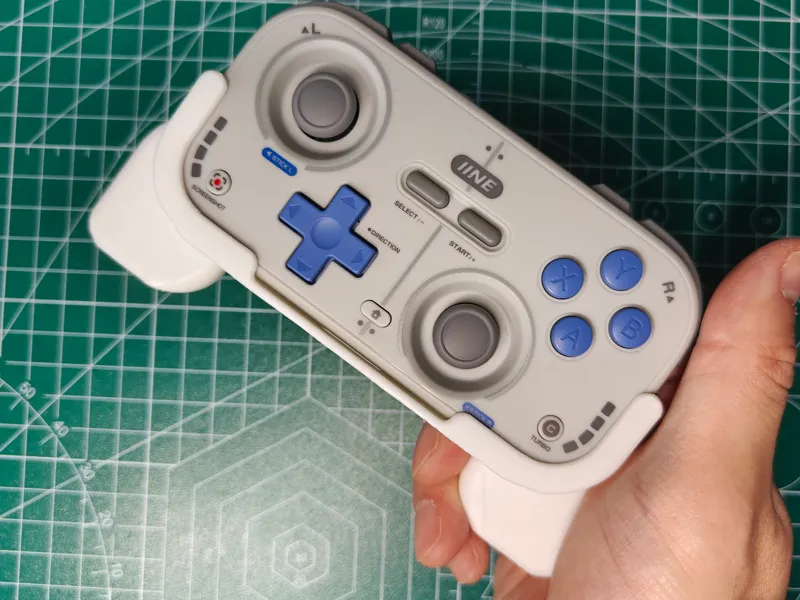 Slim ergo grip for IINE compact controller