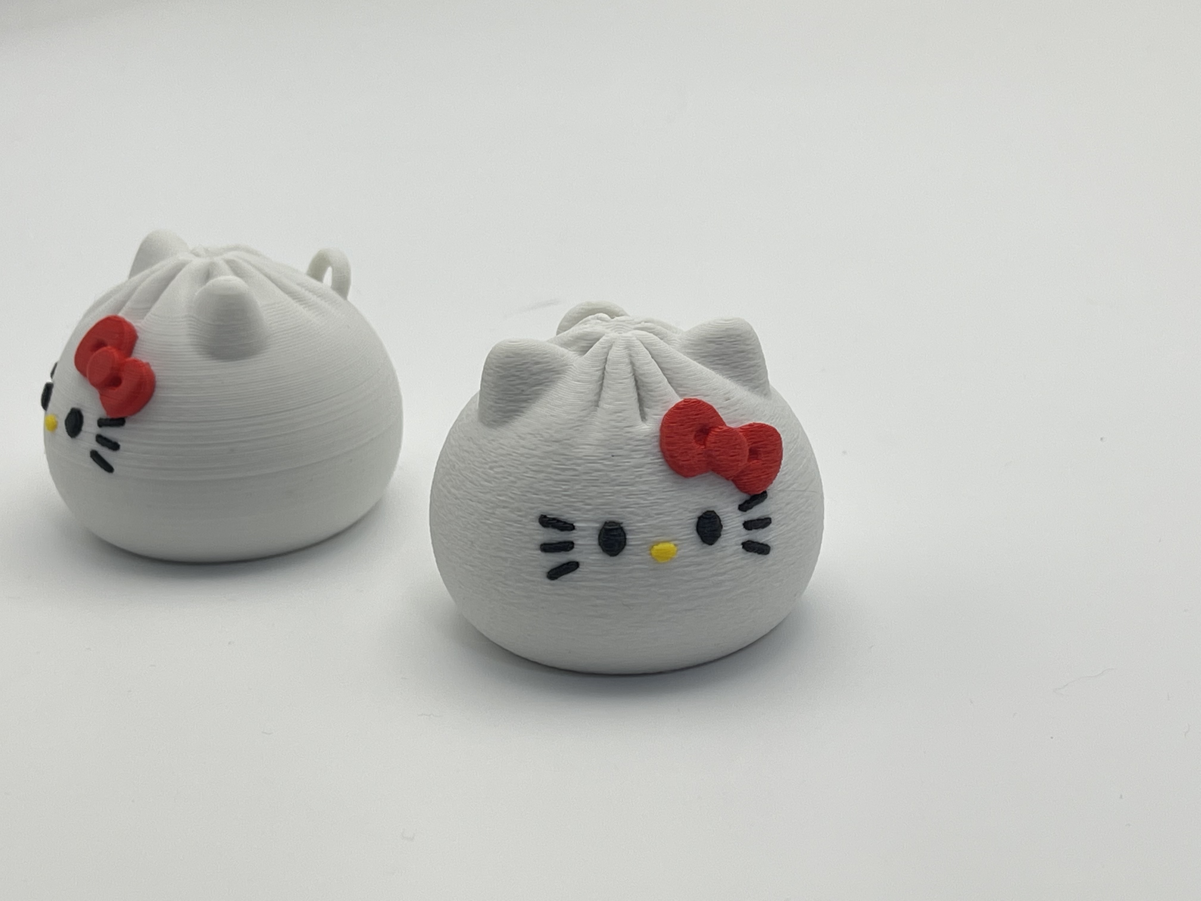 Miniatura 2 do modelo 3D Hello Kitty 凯蒂猫可爱的小笼包钥匙扣挂件 AMS多色打印
