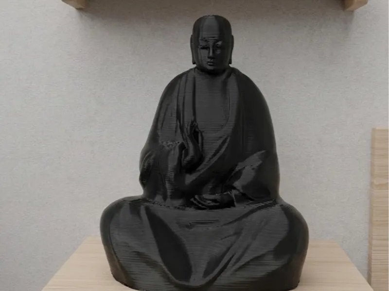 monje Sculpture