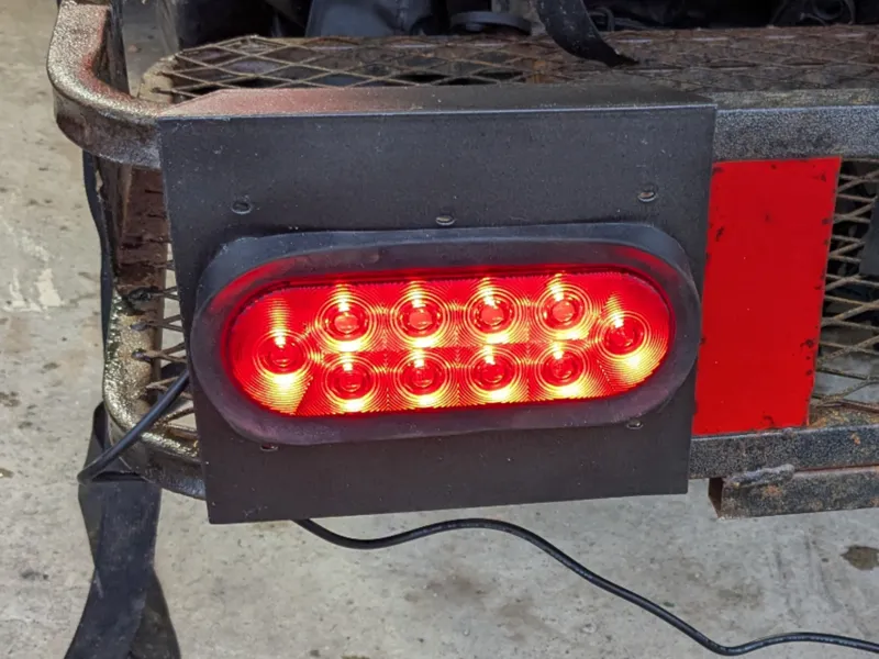 Trailer hitch cargo carrier light mount.
