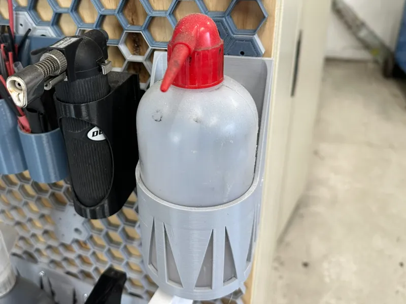 Squeeze bottle holder - wall mounted