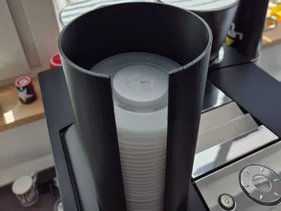 Plastic lid holder for paper cups