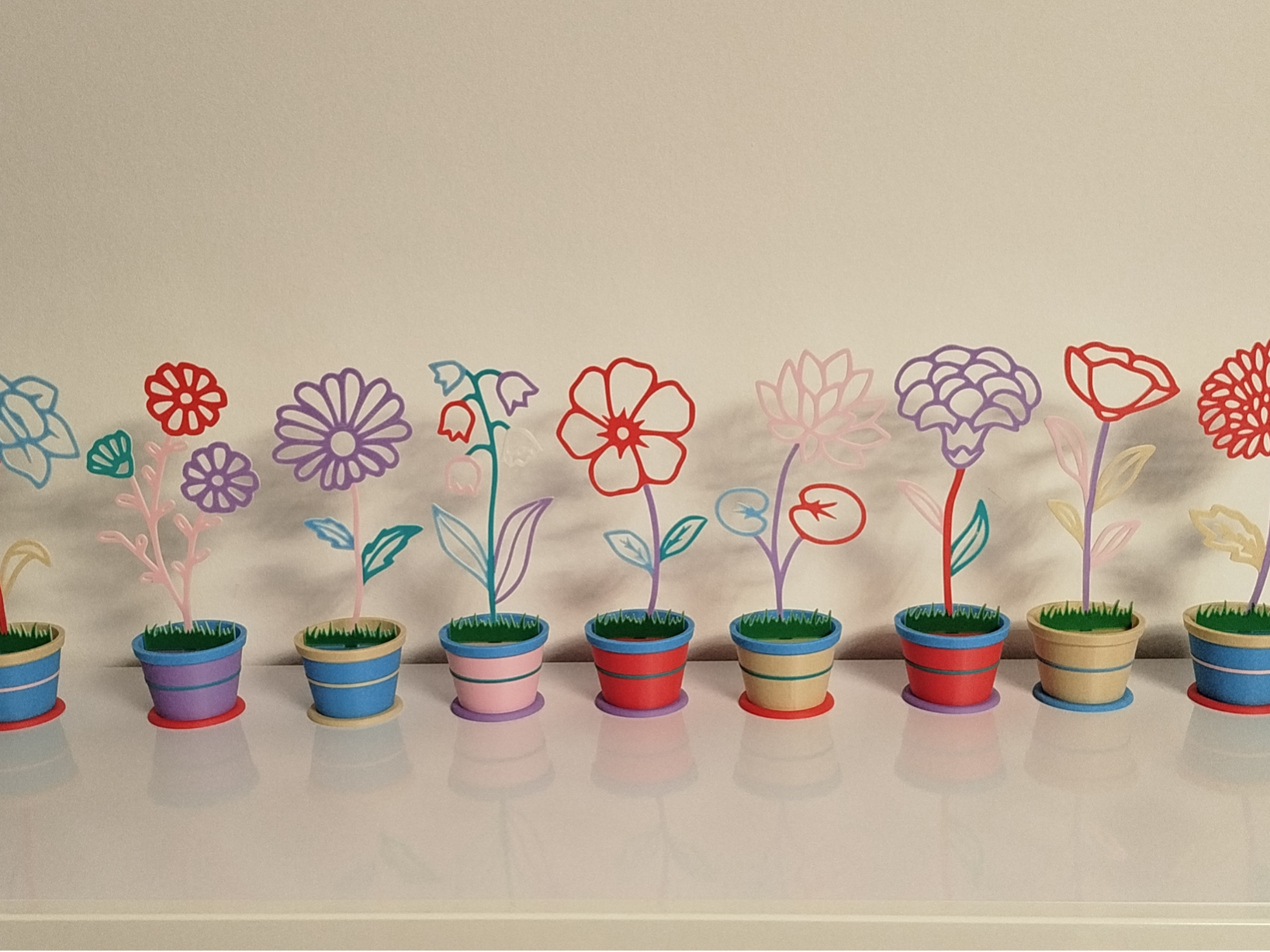 Blume im Topf bunt 