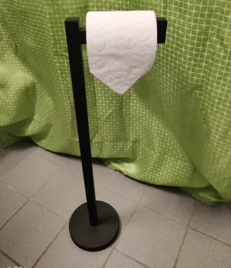 Toilet paper holder for floor