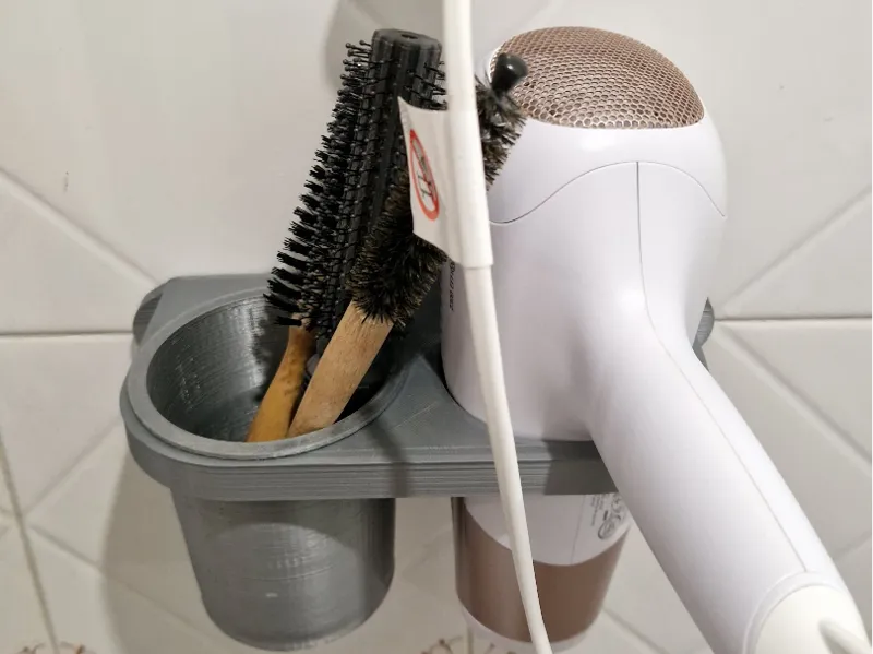 Stand for hairdryer
