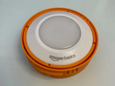 Handle with amazon basics puck light