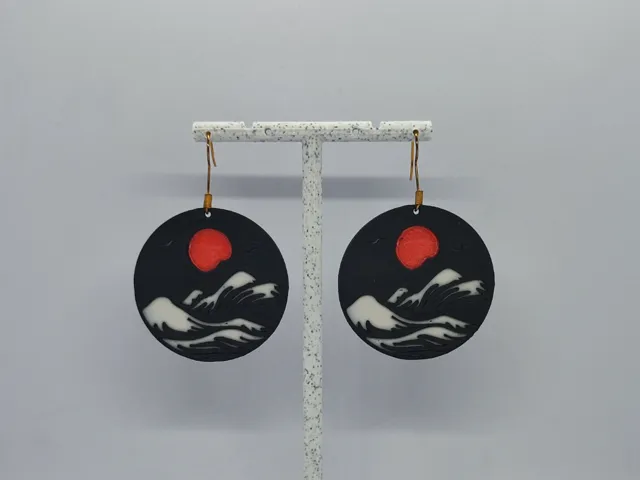 Aretes Ola y Sol