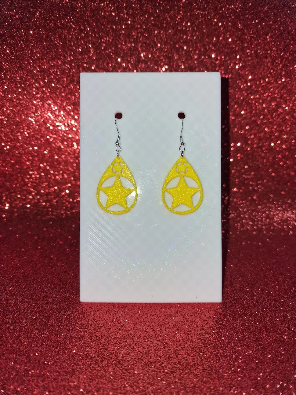 Stars in a drop earrings view 2