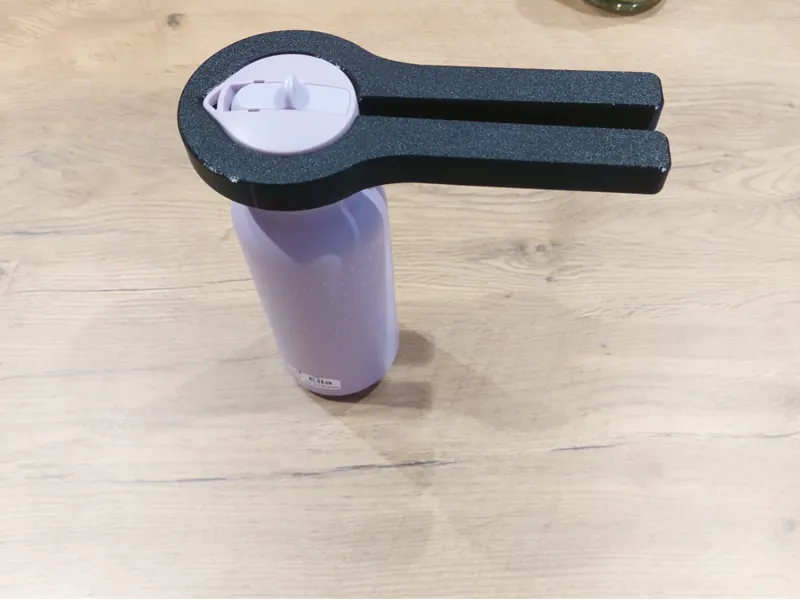 Trixie drinking bottle cap opener