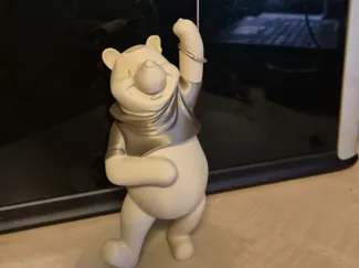 winnie the pooh with balloon