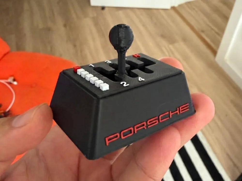 Objeto manipulable: Gear Shifter Fidget - Porsche 6 times Manual. Referencia del modelo original.