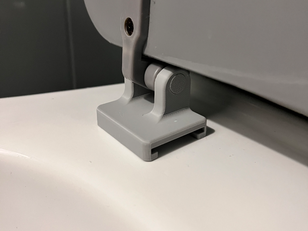 Toilet seat fixings