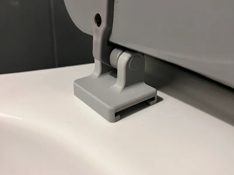 Toilet seat fixings