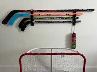 Support mural bâton de Hockey