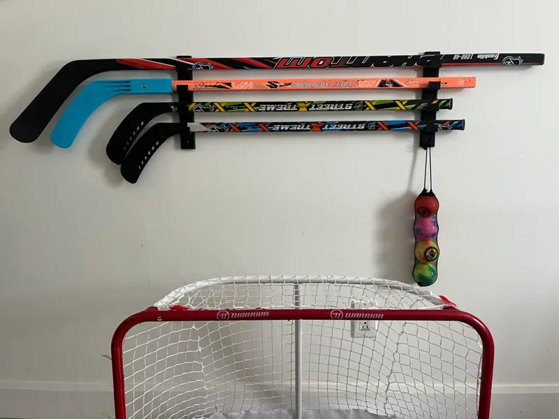 Support mural bâton de Hockey