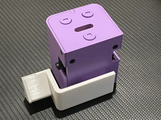 Mounting bracket for TPU assist for AMS