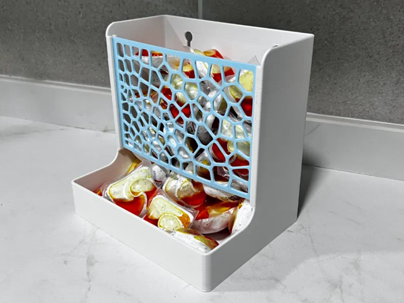 Dishwasher tablet gravity dispenser voronoi style