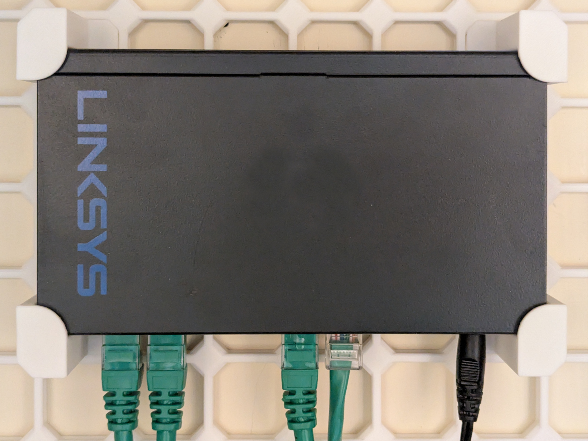 openGrid mount for Linksys LGS108 switch