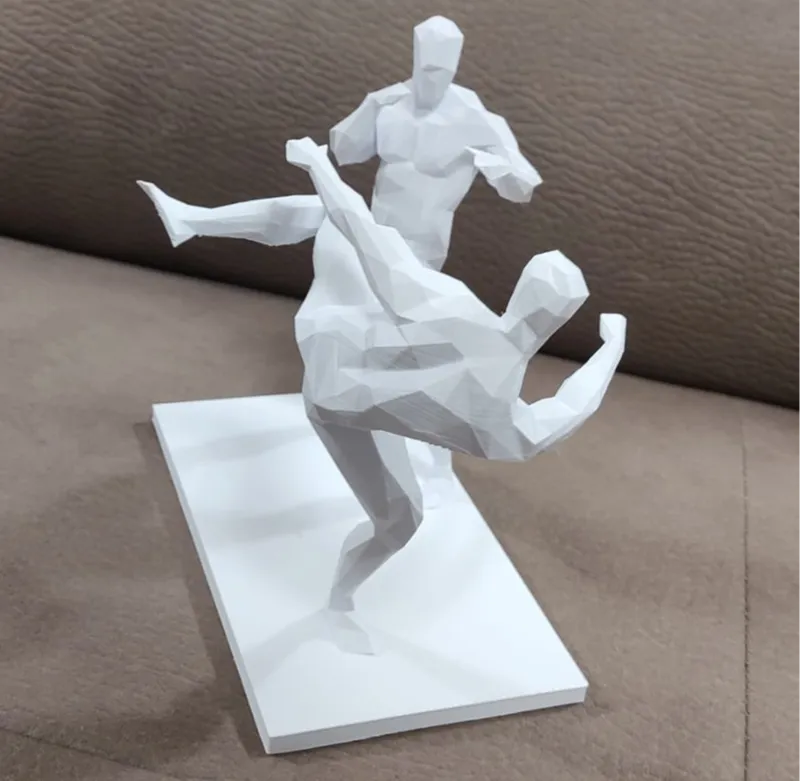 Low-poly men in karate combat