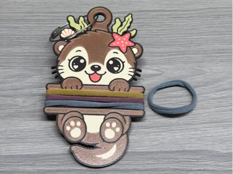 Accesorio para sujetar ligas de cabello: Otter Hair Tie Holder Keychain — referencia de MakerWorld