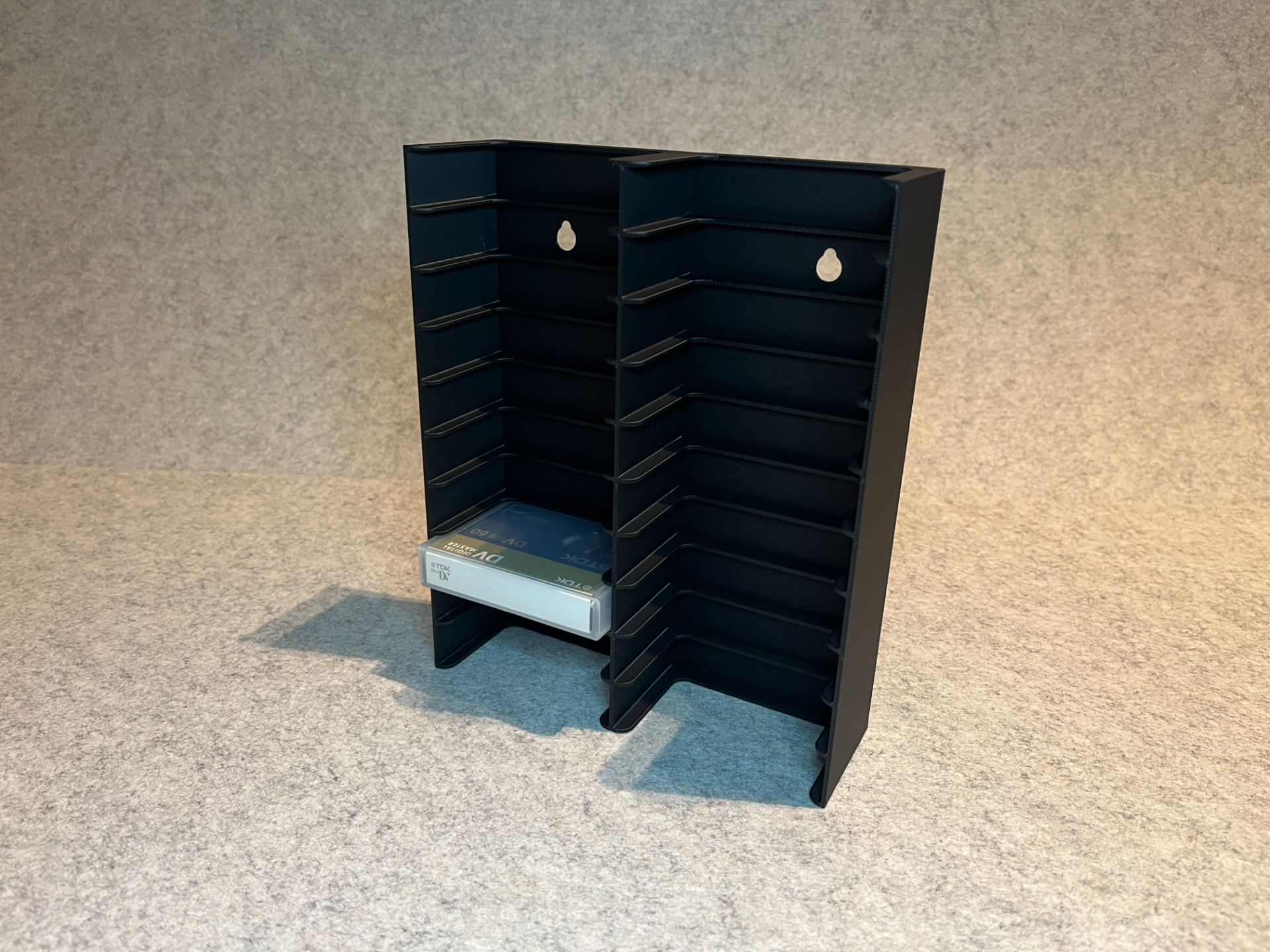Wall stand holder for MiniDV tapes