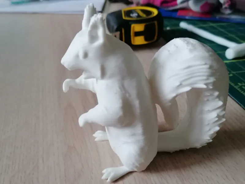 cute stylized squirrel figurine