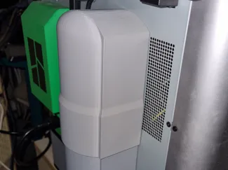 Chapeau goulotte à déchets