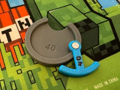Simple aid for glueing magnets onto bases.