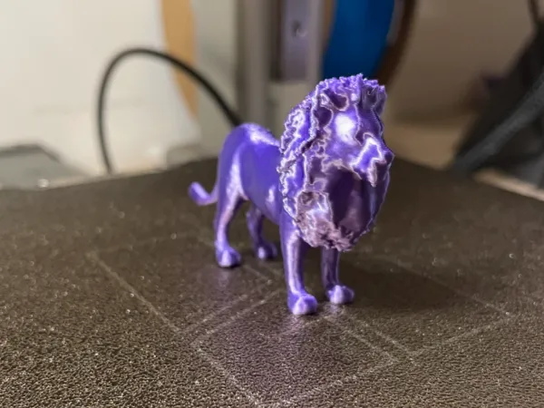 Figurine miniature de lion