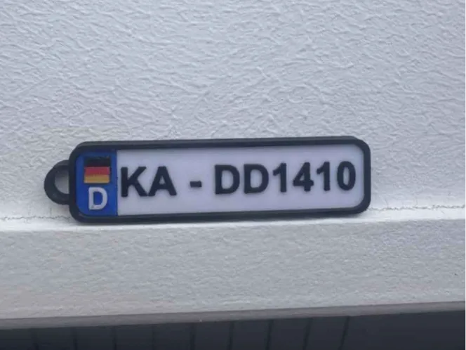Car license plate KEYCHAIN with Flag