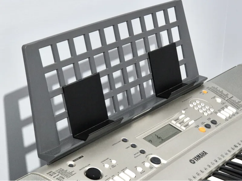 Yamaha PSR keyboard music stand clips to book tabs