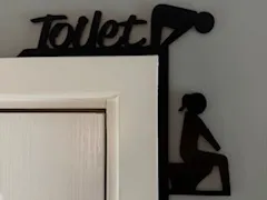 Toilet door frame hanger