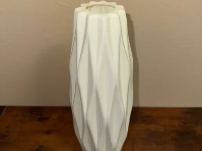 Vase with wavy ribs
