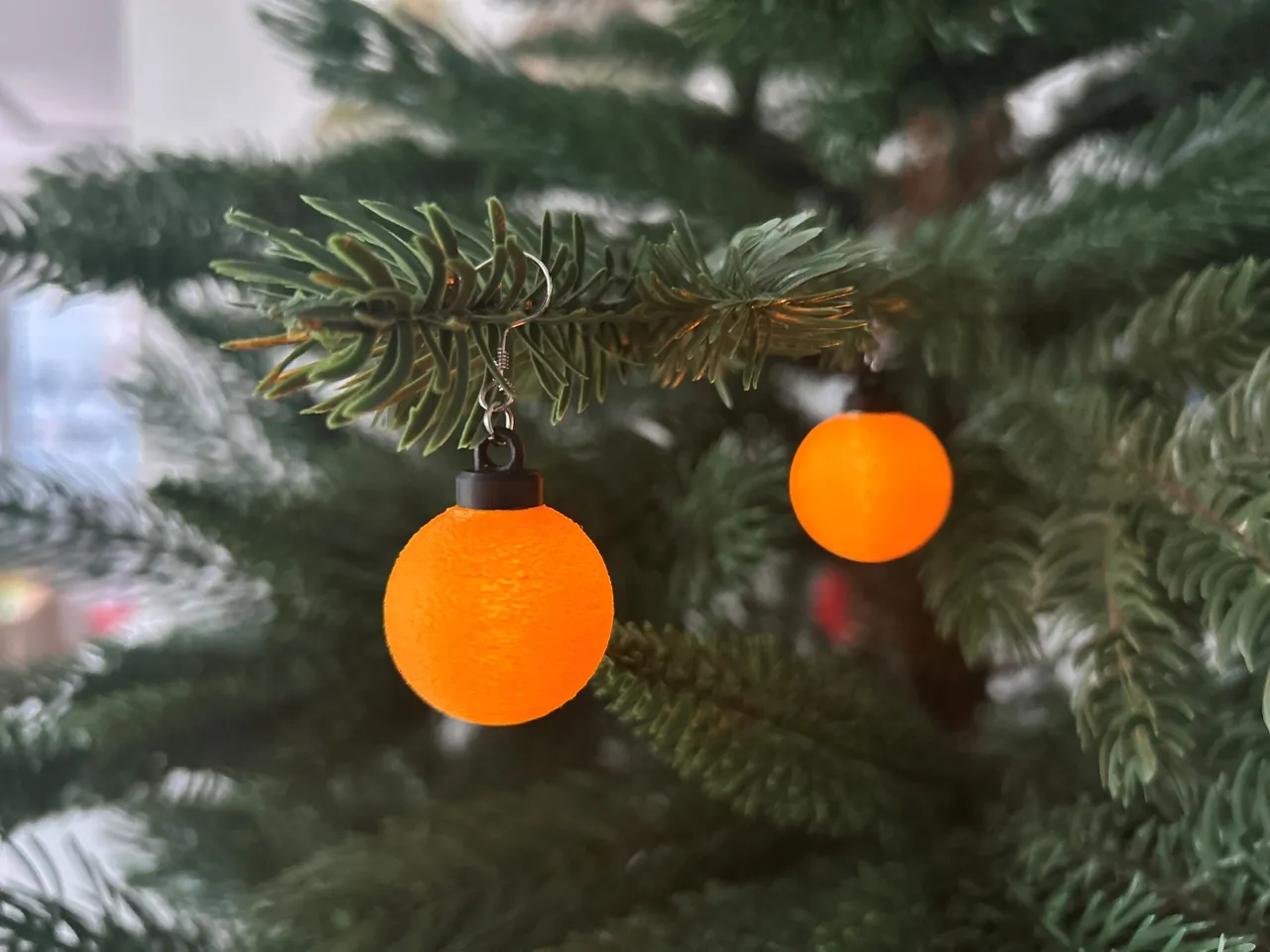 Illuminated Christmas tree bauble earrings view 2