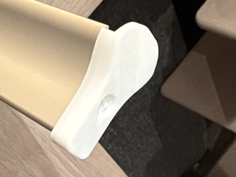 End cap for a rollo curtain