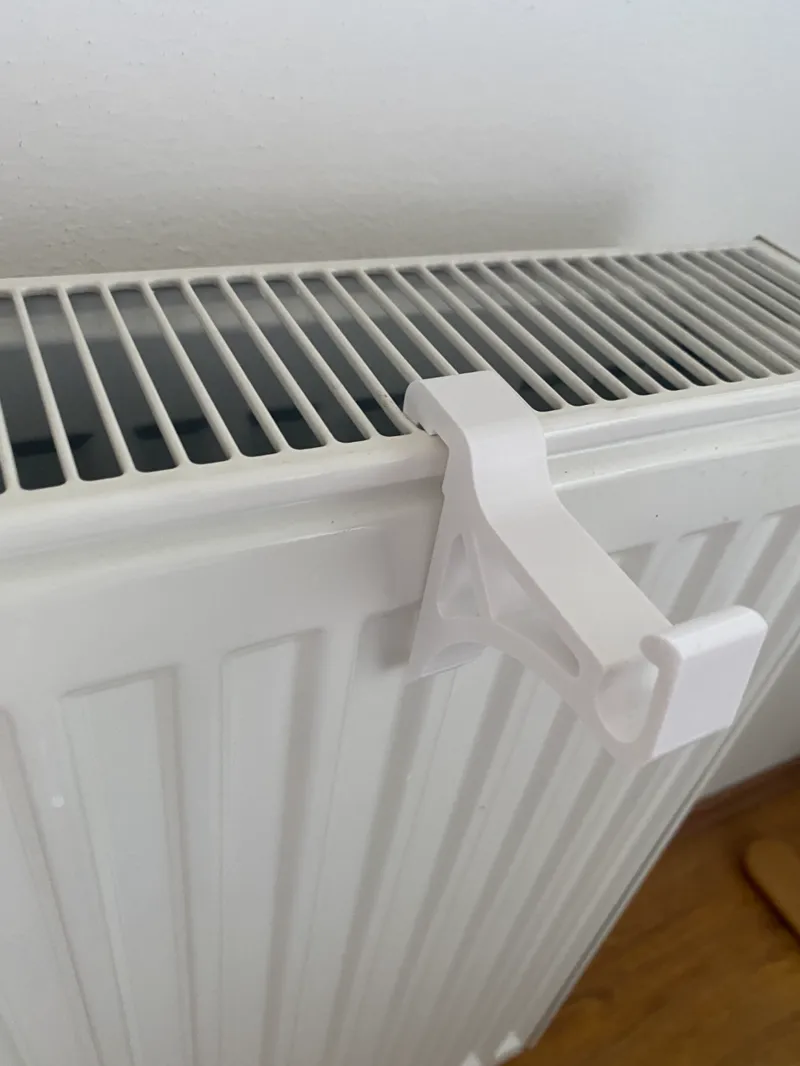 Radiator hook for clothes