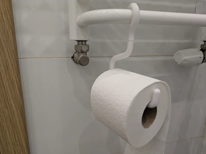 Toilet paper holder hanger
