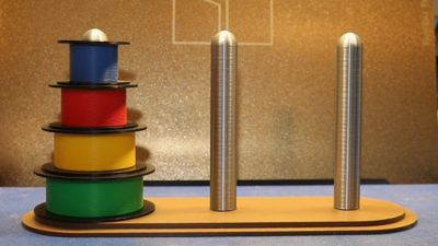 Towers of Hanoi game made of tiny filament spools