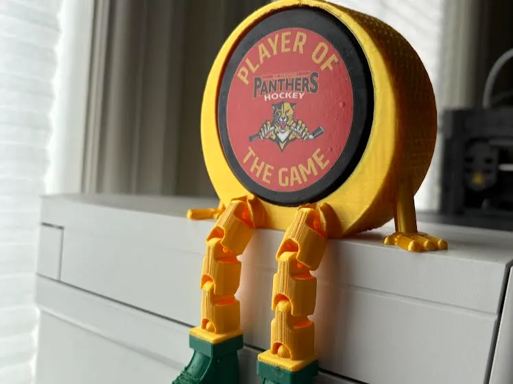Hockey Puck Buddy with Articulated Legs