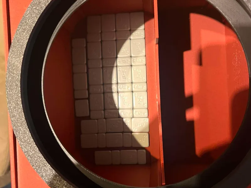 Cover to hide weights in Vault