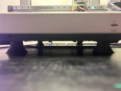 Printer riser and shock/vibration absorber