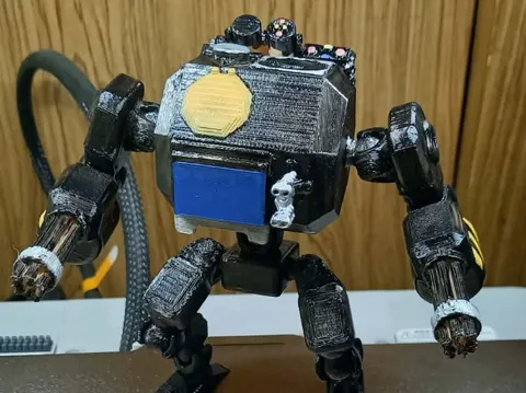 Letrero o emblema decorativo: v1 mecha — referencia de MakerWorld