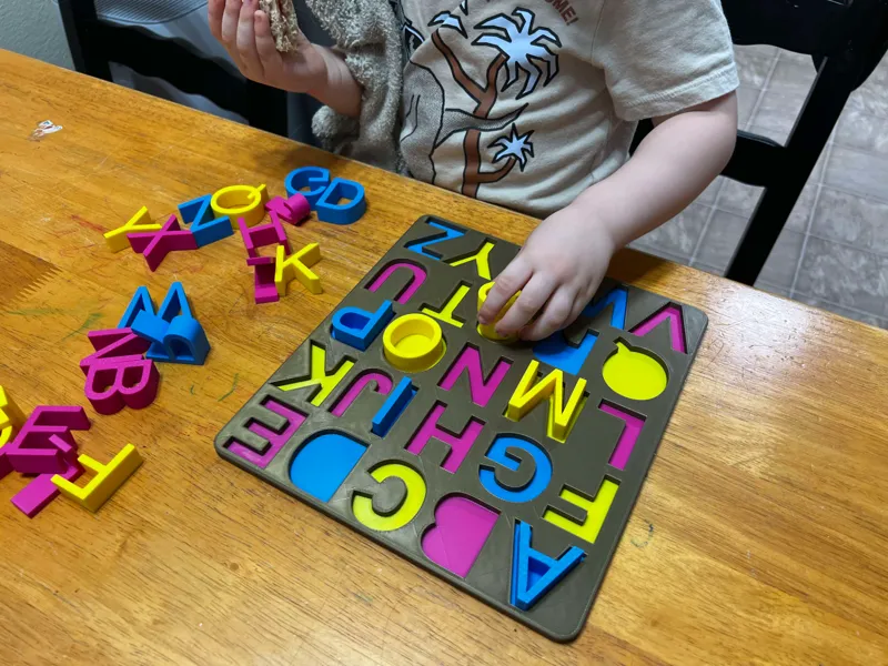 Alphabet puzzle board