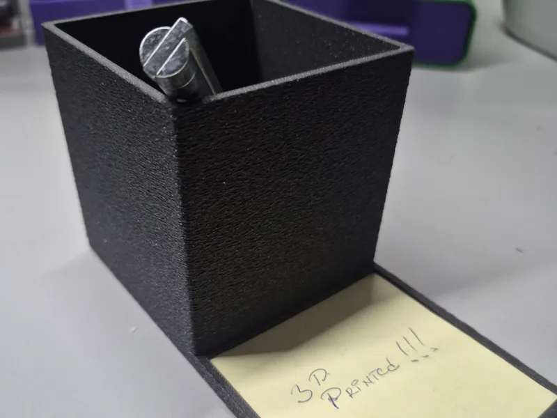 Desk organizer with sticky note slot