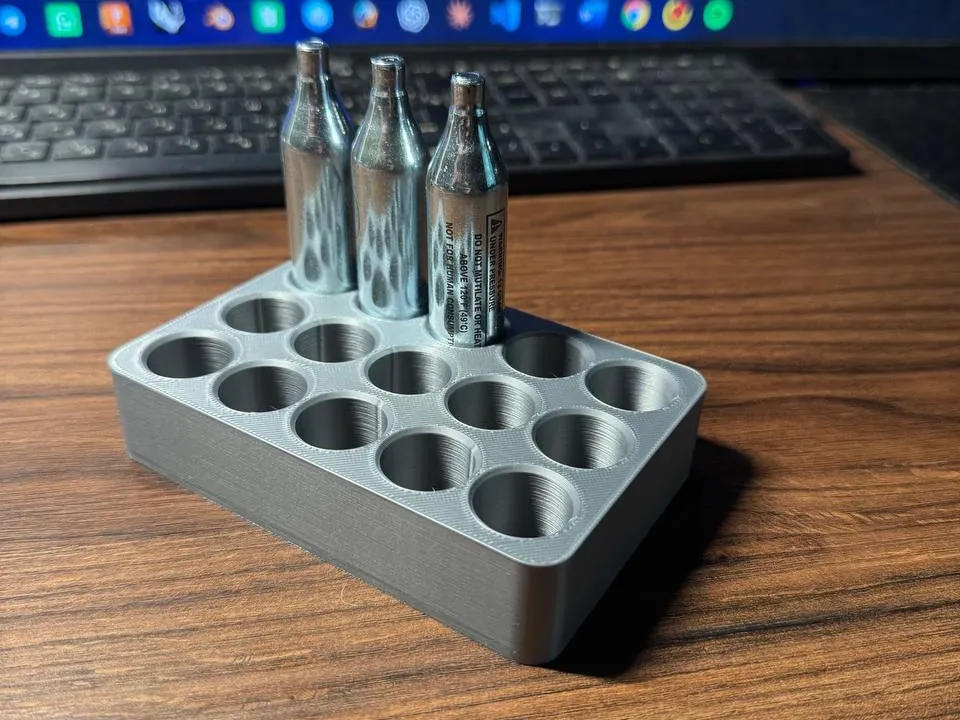 Organizador: 12g CO2 cartridge holder/organizer. Referencia del modelo original.